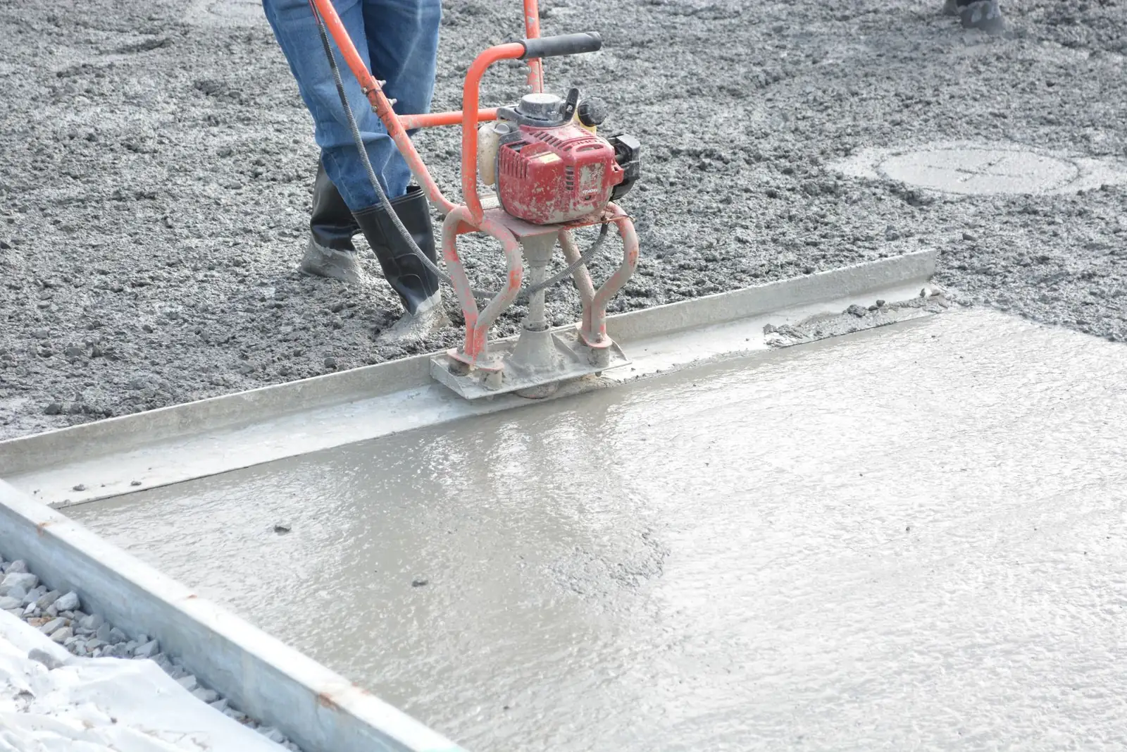 New concrete slab being finished, typical of Surprise, AZ post-tension homes