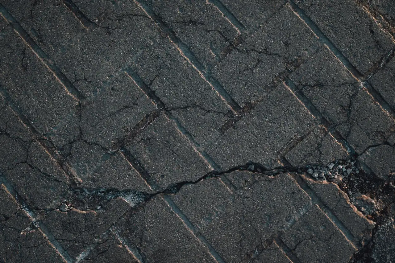 Sunken, cracked concrete flatwork that needs leveling in Peoria, AZ