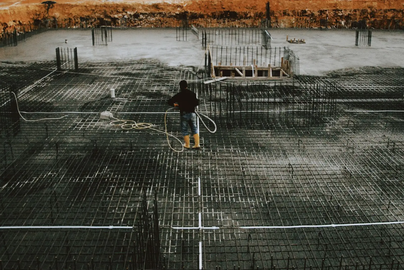 Slab reinforcement before a pour, like the post-tension slabs under Peoria, AZ homes